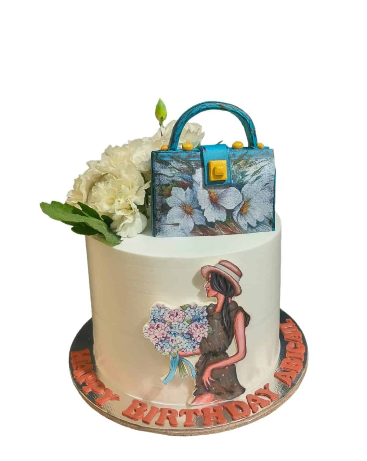 Stylish Juicy Couture Cake with Purse on Top
